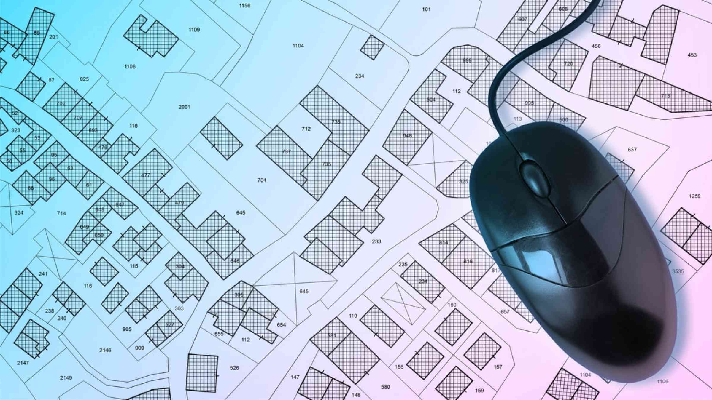 Computer mouse on urban planning map